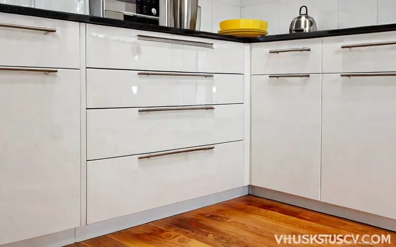 corner base cabinet with soft-close drawers and T-bar handles