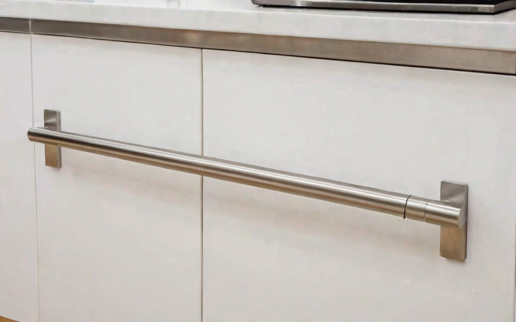 close-up of cabinet with T-bar handle and soft-close drawer